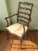 An inlaid mahogany ladder backed armchair and two reproduction tripod tables