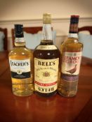 A bottle of Famous Grouse whisky, 1L, bottle of Bells old scotch whisky, 1.