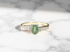 A 10ct gold emerald and diamond ring, size L CONDITION REPORT: 1.