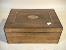 A mahogany parquetry inlaid work box, with compartmentalised interior, width 32 cm.