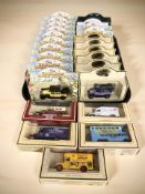 A collection of Lledo boxed die cast vehicles and delivery vans, buses, etc.