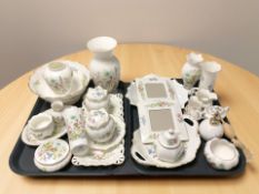 A collection of Aynsley wild tudor pattern porcelain including vases, dressing table items, etc.