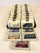 A collection of Days Gone die cast delivery vans, buses, etc.