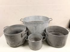 A group of aluminium catering cooking pots,