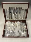 A canteen of Viners stainless steel cutlery. CONDITION REPORT: One hinge loose.