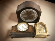 A Smiths Enfield oak Art Deco mantel clock, height 20 cm, and two further clocks.