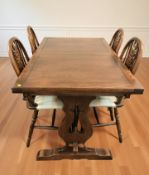 An Old Charm oak refectory pull out extending dining table,