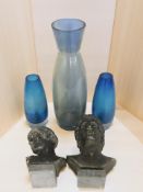 Two patinated metal Greek style busts and blue glass vases