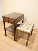 A walnut two tier occasional table fitted a drawer together with piano stool