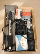 A group of cameras including Chinon, a Photax slide viewer, a Viewmaster 3D viewer,