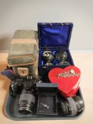 A Canon EOS500 camera body with Canon E-200mm lens, a further Canon EF35-80mm lens,