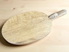 A Robert 'Mouseman' Thompson of Kilburn oak cheese board, with carved mouse signature, length 39.