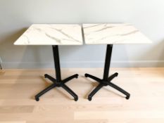 A set of thirteen enamelled metal and faux marble bar / restaurant tables,