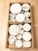 A collection of Thomas silver-rimmed porcelain tea, coffee and dinner wares.