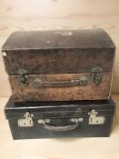 Two stitched leather luggage cases, width 44 cm.