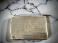 A silver purse,