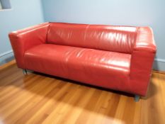 A contemporary stitched red leather three seater settee, 180 cm x 87 cm x 67 cm.
