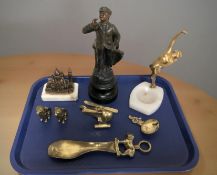 An Art Deco style gilt metal and onyx ashtray surmounted by a dancer,