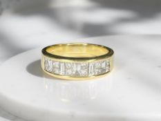 An 18ct gold diamond half-eternity ring, approximately 1.