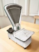 A large enameled avery scale, height 76 cm.