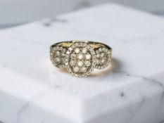 A gold diamond ring, the total diamond weight approximately 0.50 carat, size P.