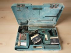 A Makita drill, in case.