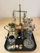 A pair of 19th century ornate silver plated candlesticks, further brass pair, two balance scales,