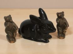 A patinated hollow cast metal figure of a rabbit, length 11 cm,