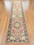 A machined Persian designed runner, 330 cm x 80 cm.