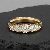 An antique 18ct gold five stone diamond ring, the total diamond weight approximately 0.