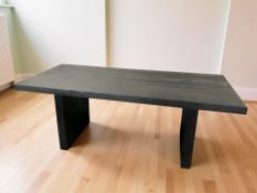 An ebonised rectangular twin pedestal dining table, 200 cm x 90 cm x 77 cm.