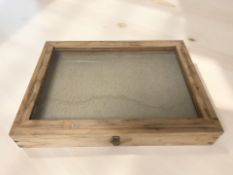A glazed pine counter top display box, width 60 cm.