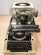 A Zephyr electric sewing machine and a vintage typewriter.