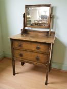 An Edwardian oak two drawer mirror back dressing chest, 77 cm x 44 cm x 138 cm.