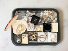 A group of jewellery comprising silver ingot pendants and charm bracelet,