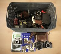 Assorted vintage cameras including Zenit, other Russian examples, two photography related volumes.