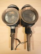 A pair of antique coach lamps.