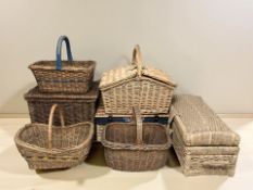 A group of wicker hampers and baskets.