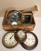 A pine crate with stencilled decoration containing timepieces, thermometer, etc.