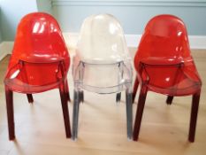 Three Xinsenth plastic chairs.