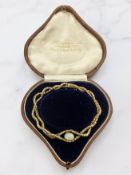 A 18ct gold and opal bracelet, length 20cm CONDITION REPORT: 13.