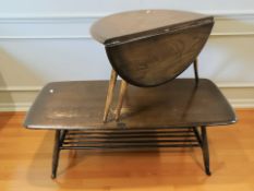 Two Ercol stained elm occasional tables, largest 105 cm wide.