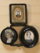 A late 19th century coloured photographic portrait miniature of a lady on porcelain panel,