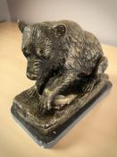 A contemporary hollow cast bronze sculpture of a bear and salmon on marble plinth, length 31 cm.