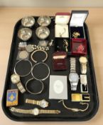 A collection of costume jewellery, lady's and gents wristwatches, bangles, coins and fobs,