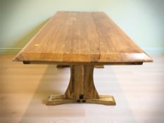 A contemporary hardwood refectory dining table,