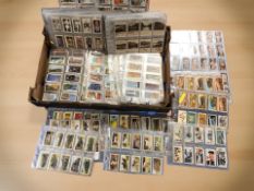 A very large quantity of Brooke Bond and Wills cigarette cards including many full sets.