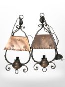 A pair of wrought metal copper finish hanging light shades, length 56 cm.