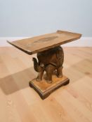 An Eastern hardwood elephant occasional table,
