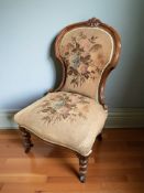 A Victorian walnut lady's salon chair.